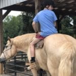 teen on a horse